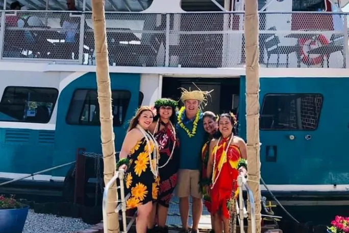 a group of people standing in front of a building