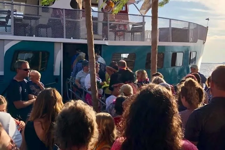 a group of people standing in front of a crowd