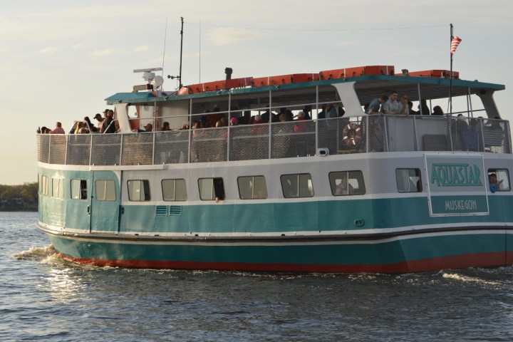 a small boat in a large body of water