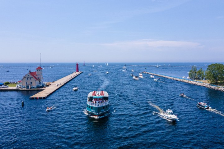a small boat in a large body of water